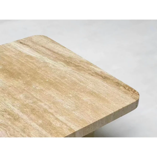 Wabi-Sabi Travertine Square Coffee Table on Column Base in sand — in a room setting