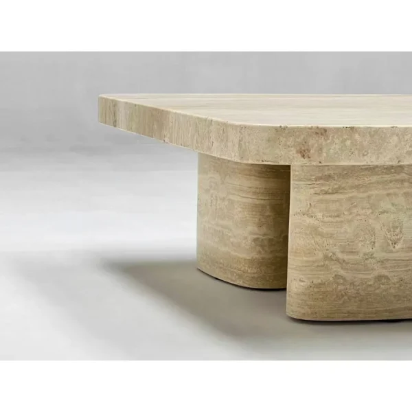Wabi-Sabi Travertine Square Coffee Table on Column Base in sand — in a room setting