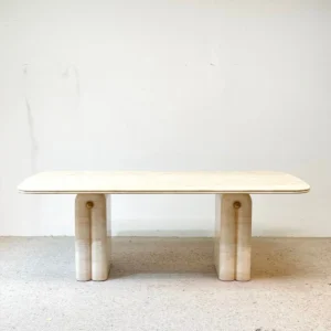 Wabi-Sabi Travertine Dining Table with Arched Legs in oatmeal — front view