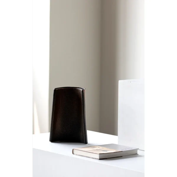 Wabi-Sabi Twisted Slab Ceramic Vase in Charcoal, Short — in a room setting