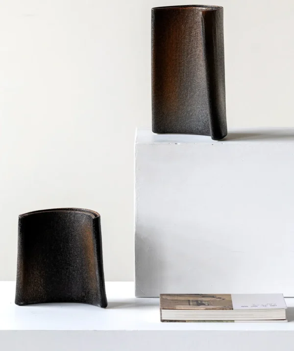Wabi-Sabi Twisted Slab Ceramic Vase in Charcoal, Short — in a room setting