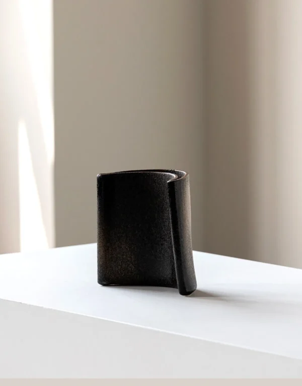 Wabi-Sabi Twisted Slab Ceramic Vase in Charcoal, Short — in a room setting