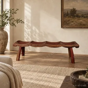 Wabi Seat Carved Wood Bench in Red-Brown — in a room setting