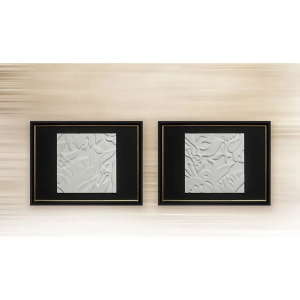 White Plaster Relief Set of 2 in ivory — in a room setting