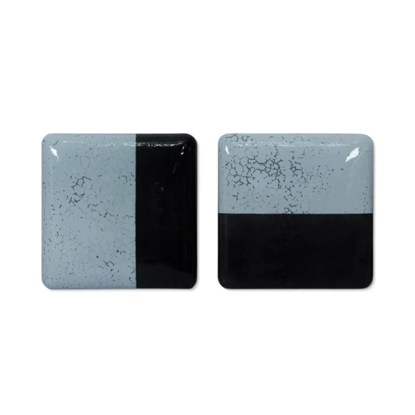 Glazed Tile Pair in Sky Blue and Black, Mirrored, 28 x 28 — in a room setting