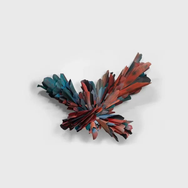 Feather Burst Wall Sculpture in rust — in a room setting