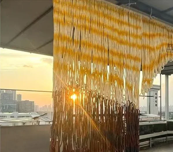 Monumental Arched Fibre Curtain in mustard — detail