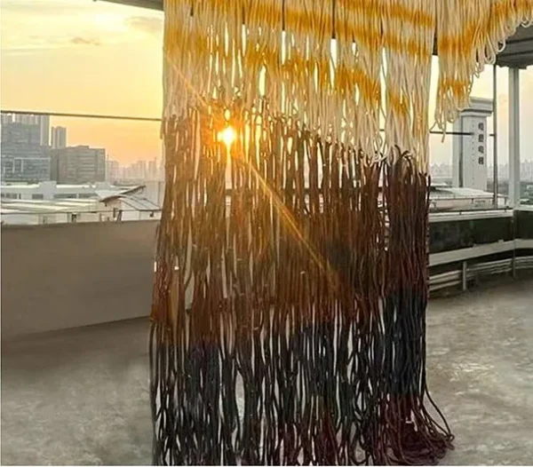 Monumental Arched Fibre Curtain in mustard — detail