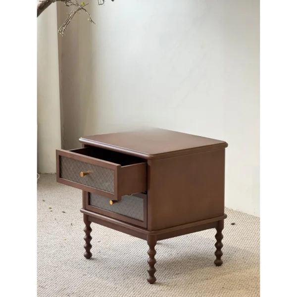 Walnut French Nightstand with Cane Drawers and Turned Legs in walnut — in a room setting