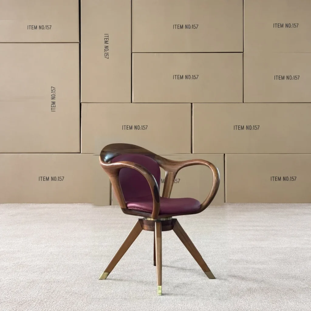Walnut Sculpted Armchair in walnut — front view