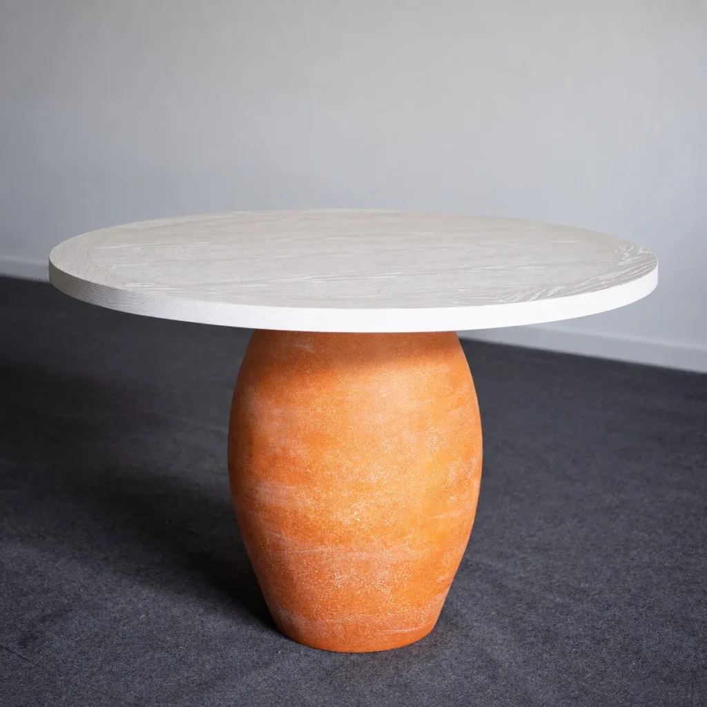 Terracotta Urn-Base Round Dining Table in rust — front view