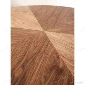 Water Drop Round Table with Wood Top and Marble Base in walnut — in a room setting