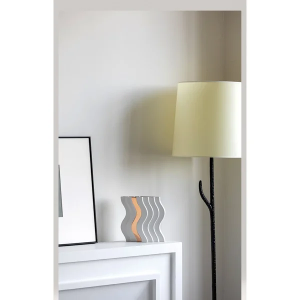 Wave-Form White Ceramic Vase with Gold Band in ivory — in a room setting