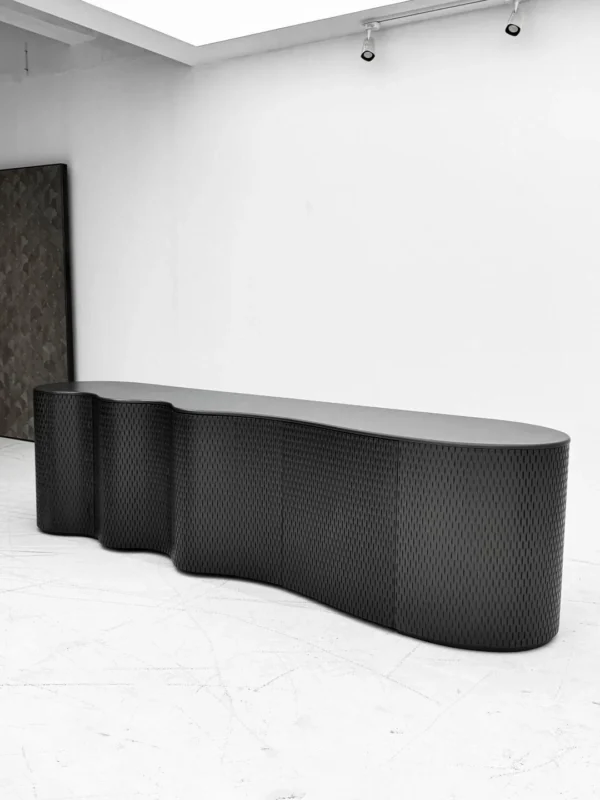 Wave-Form Sideboard in Textured Dark Grey Lacquer — in a room setting