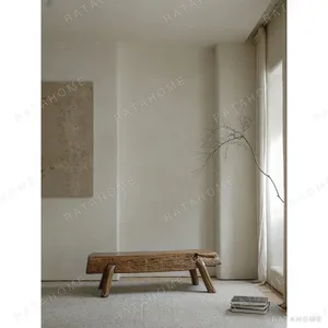 Weathered Reclaimed Wood Tree Trunk Bench in clay — in a room setting