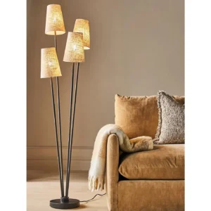 Wentworth Four-Head Branch Floor Lamp with Jute Shades in black — in a room setting