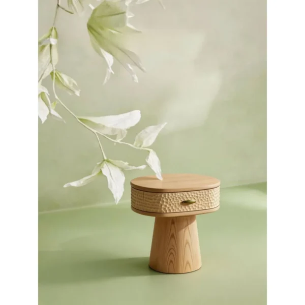 Wenyu Hammered-Front Round Nightstand in natural oak — in a room setting
