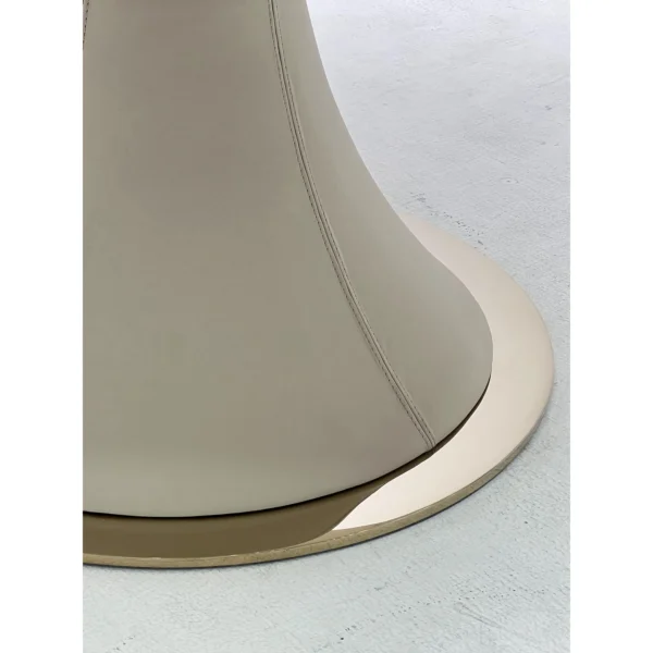 White Stone Round Table on Leather-Wrapped Trumpet Base in ivory — in a room setting