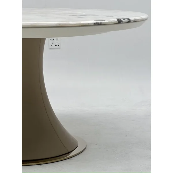 White Stone Round Table on Leather-Wrapped Trumpet Base in ivory — in a room setting
