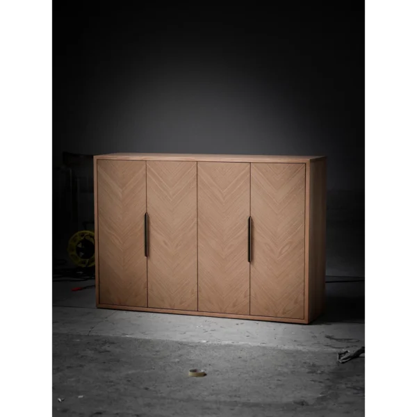 White Oak Herringbone Four-Door Sideboard in natural oak — in a room setting