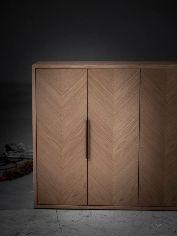 White Oak Herringbone Four-Door Sideboard in natural oak — in a room setting