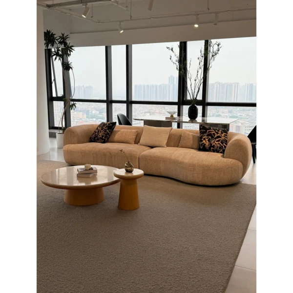 Cashew Curved Sofa in Oatmeal Chenille with Wide Rounded — in a room setting