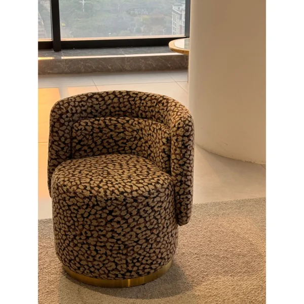 Wild Leopard Linen Barrel Lounge Chair on Brass Base in clay — in a room setting