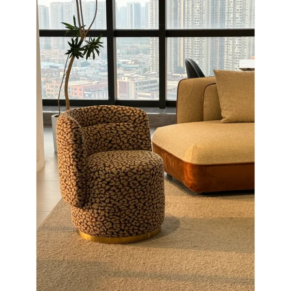 Wild Leopard Linen Barrel Lounge Chair on Brass Base in clay — in a room setting