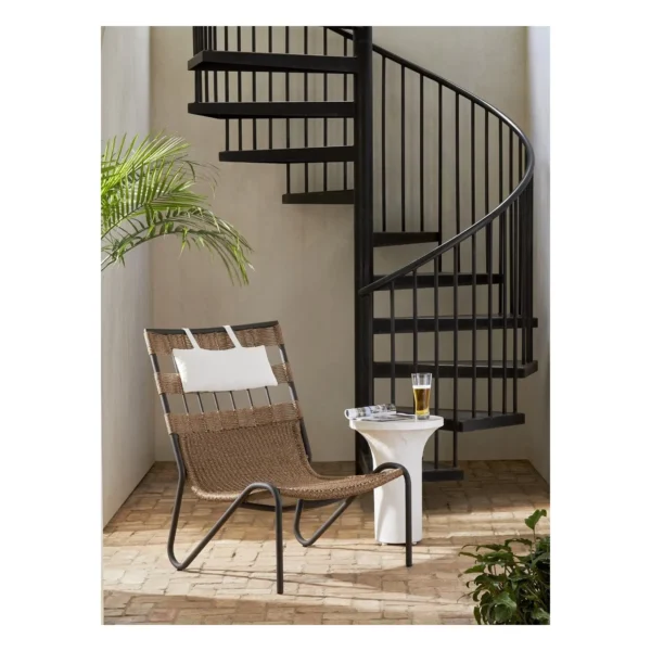 Woven Outdoor Lounge Chair on Black Aluminium Sled Frame in sand — in a room setting