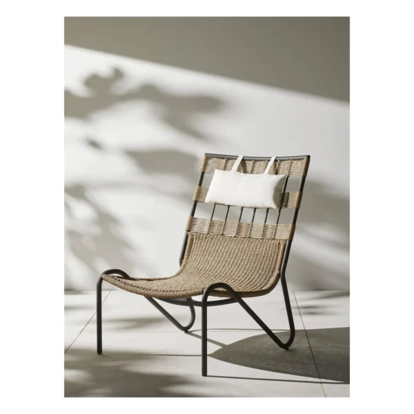 Woven Outdoor Lounge Chair on Black Aluminium Sled Frame in sand — in a room setting