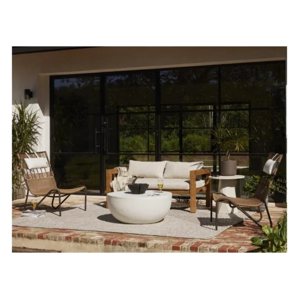Woven Outdoor Lounge Chair on Black Aluminium Sled Frame in sand — in a room setting