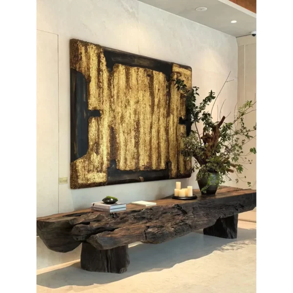 Carved Wood and Gold Leaf Abstract Wall Art in brushed brass — in a room setting
