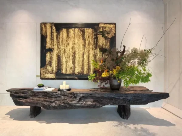 Carved Wood and Gold Leaf Abstract Wall Art in brushed brass — in a room setting
