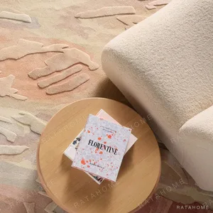 Oval Bark Relief Rug in Cream, Blush and Sage — in a room setting