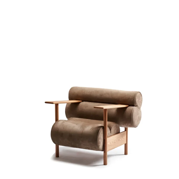 Low Oak Lounge Chair with Olive Leather Roll Cushions in natural oak — in a room setting