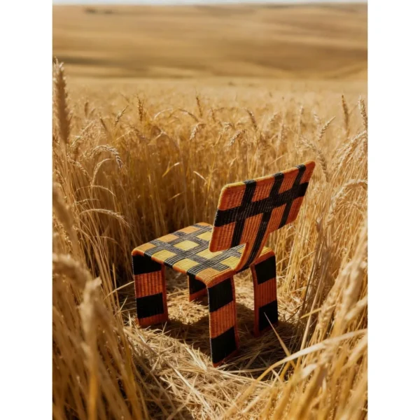 Woven Net Chair in Orange and Black Check Webbing — in a room setting