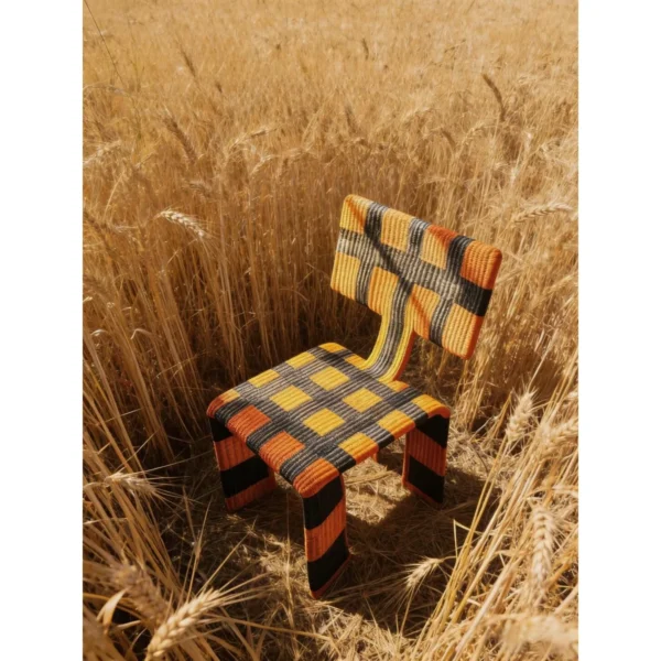 Woven Net Chair in Orange and Black Check Webbing — in a room setting
