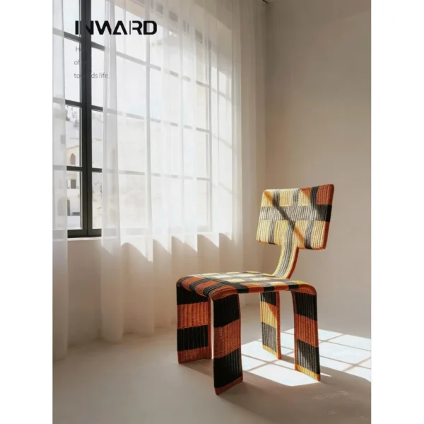 Woven Net Chair in Orange and Black Check Webbing — in a room setting