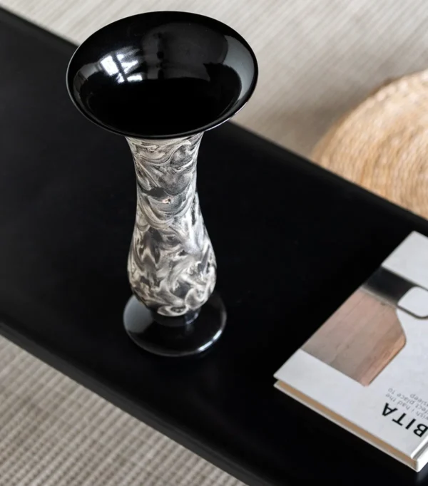 Artist Collaboration Black and Silver Marbled Trumpet Vase in black — in a room setting