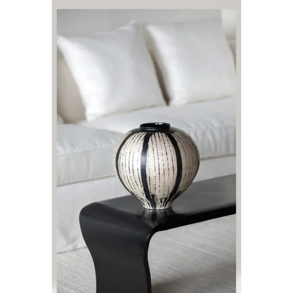Artist Collaboration Hand-Painted White Line Sphere Vase in black — in a room setting