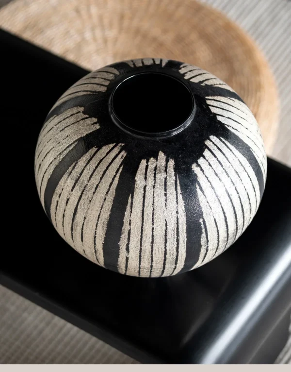 Artist Collaboration Hand-Painted White Line Sphere Vase in black — in a room setting