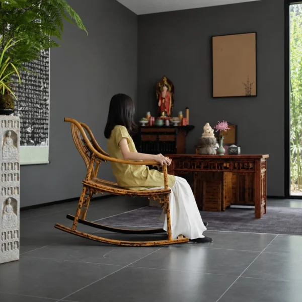 Xiangfei Mottled Bamboo Rocking Chair in clay — in a room setting