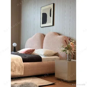 Xinyu Heart-Shaped Headboard Bed in rose stone — in a room setting