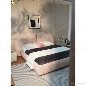 Xinyu Heart-Shaped Headboard Bed in rose stone — in a room setting