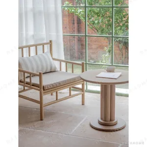 Xumu Ash Spindle Lounge Chair in natural oak — in a room setting