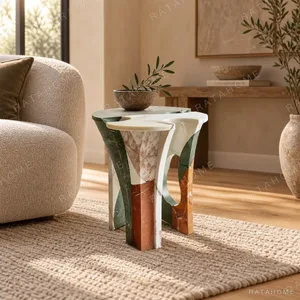 Yeshi Smelted Stone Side Table in Mixed Marble — in a room setting