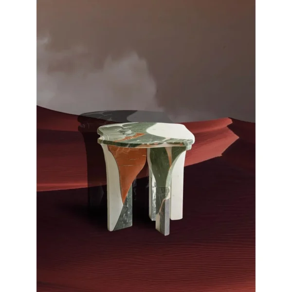 Yeshi Smelted Stone Side Table in Mixed Marble — in a room setting