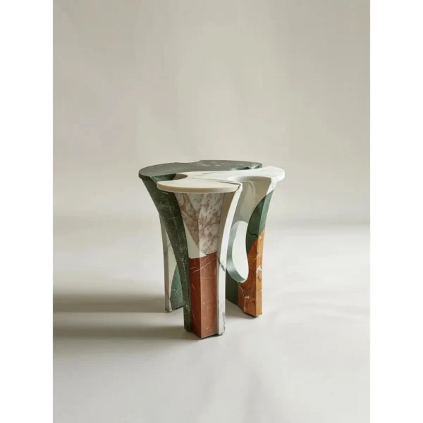Yeshi Smelted Stone Side Table in Mixed Marble — in a room setting