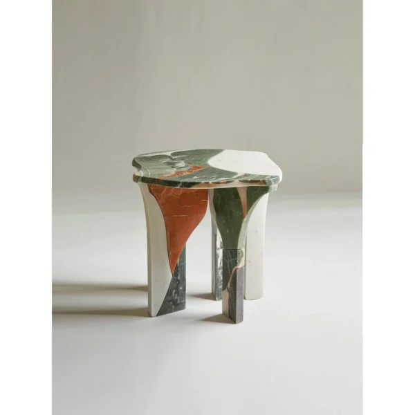Yeshi Smelted Stone Side Table in Mixed Marble — in a room setting
