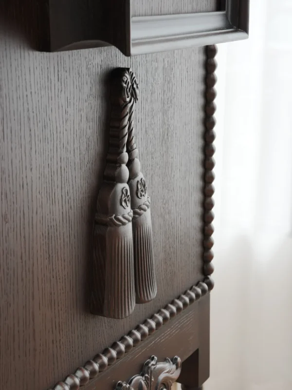 Carved Sequence Cabinet on Barley-Twist Legs with Tassels in black — detail